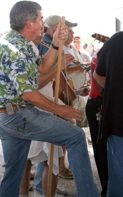 Bill playing his washtub bass at a Terry Cassidy's Superbowl Pickin' Party for Habitat for Humanity.